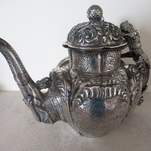 Antique Teapot with Dragon Handle and Elephant Spout