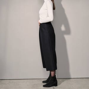 High-waisted wide wool trousers with deep pleats and side pockets, wool culottes with viscose lining image 1