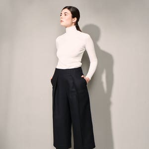 High-waisted wide wool trousers with deep pleats and side pockets, wool culottes with viscose lining image 2