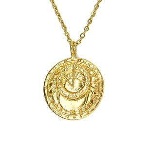May include: Gold necklace with a round pendant featuring a sun and moon design with Roman numerals around the edge.