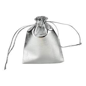 May include: A silver drawstring bag made of a shimmery, textured fabric. The bag is empty and has a white background.