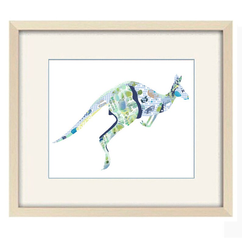 May include: A framed print of a stylized kangaroo silhouette, made up of blue, green, and white geometric shapes. The kangaroo is leaping forward with its tail extended.