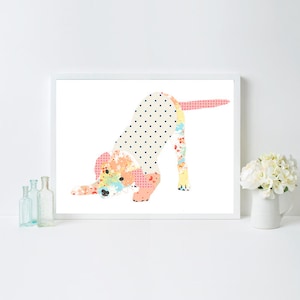 May include: A colorful patchwork print of a dog in a playful pose. The dog is made up of different patterns and colors, including polka dots, floral prints, and geometric shapes. The dog is in a playful pose, with its head tilted and its tail wagging.