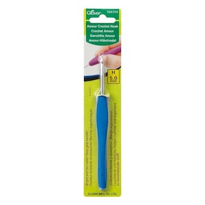 May include: A blue and silver crochet hook with a 5.0 mm hook size, packaged on a green and white card. The packaging includes the text "Amour Crochet Hook" and "Easy grip handle!"