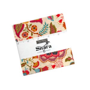 May include: A stack of square fabric swatches with a cream background and a multi-coloured floral pattern in shades of pink, orange, teal, and green. A white paper band labelled Moda Fabrics Supplies Sitara by Crystal Manning wraps the centre.