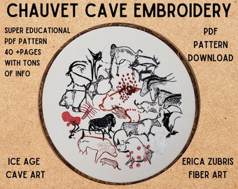 May include: Embroidered artwork depicting a scene from the Chauvet Cave, featuring black and white drawings of animals on a white background. The embroidery is framed in a brown wooden hoop. The text "Chauvet Cave Embroidery" is at the top of the image, and the text "PDF Pattern Download" is on the right side of the image.