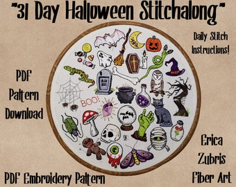 May include: A white embroidery hoop with a variety of Halloween-themed designs, including a ghost, a bat, a spider web, a pumpkin, a witch's hat, a cauldron, a potion bottle, a skull, and a mummy. The text "31 Day Halloween Stitchalong" is at the top of the hoop. The text "PDF Embroidery Pattern" is at the bottom of the hoop. The text "Daily Stitch Instructions!" is on the right side of the hoop. The text "Erica Zubris Fiber Art" is on the right side of the hoop.