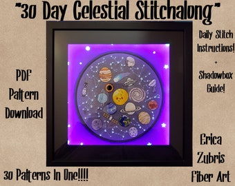 May include: A framed embroidery piece depicting a celestial scene with planets, stars, and a spaceship. The embroidery is illuminated with purple LED lights. The text "30 Day Celestial Stitchalong" is at the top of the image. The text "PDF Pattern Download" is on the left side of the image. The text "Daily Stitch Instructions!" is on the right side of the image. The text "Shadowbox Guide!" is below the text "Daily Stitch Instructions!" The text "Erica Zubris Fiber Art" is at the bottom right of the image. The text "30 Patterns In One!!!" is at the bottom of the image.