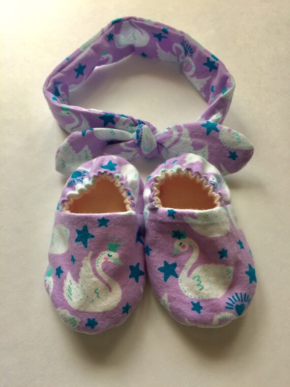 purple baby shoes