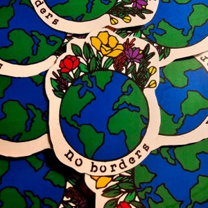 May include: A sticker with a colorful illustration of a globe surrounded by flowers and the text "no borders".