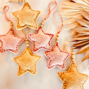 Organic Baby Wool Star Rattles - handmade with organic materials and naturally dyed baby toys