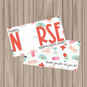 May include: A set of three ceramic mugs with a speckled, matte finish. The mugs are in shades of cream, light gray, and dark gray. Each mug has a simple, minimalist design, perfect for coffee or tea.