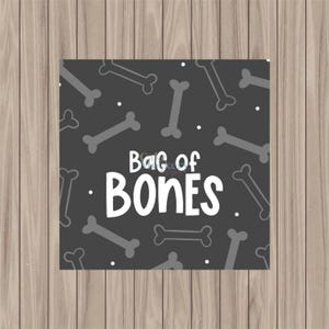 May include: Square graphic with a dark grey background and a pattern of light grey bones. The text "Bag of BONES" is in white, with a playful font. Small white dots are scattered throughout the design.