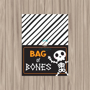 May include: Black and white striped background with a black sign that says "BAG of BONES" in orange text. A cartoon skeleton with a smiling face is on the sign.