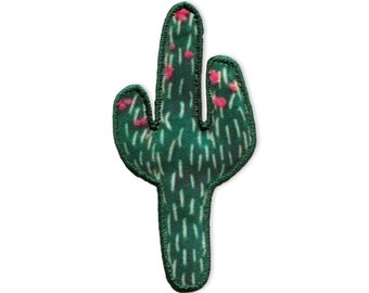 May include: A green felt cactus patch with pink flowers. The cactus is a simple design with a single stem and two arms.