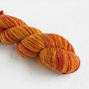 Aade long Gradient Flame colorway yarn for shawls and Lace knitting