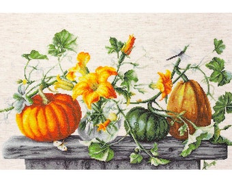 May include: A still life painting of a fall harvest with three pumpkins, orange, green, and yellow, and yellow flowers in a vase. The pumpkins are on a wooden table with green leaves and vines.