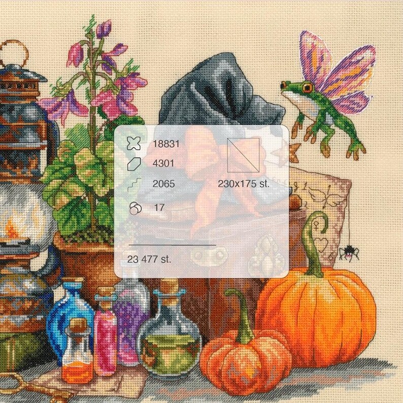 May include: A cross-stitch pattern featuring a lantern, purple flowers, a frog with wings, pumpkins, and glass bottles. A semi-transparent overlay displays technical data including 18831, 4301, 2065, 17, and 23 477 st. with a 230x175 st. grid dimension.