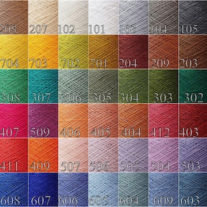 May include: A chart of 121 different colored yarn skeins, arranged in 11 rows of 11 skeins each. The yarn skeins are all the same size and are arranged in a grid pattern. The colors of the yarn skeins range from light to dark, and from warm to cool.