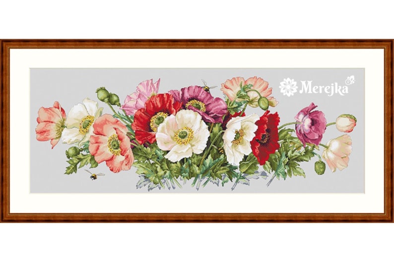May include: A cross-stitch pattern featuring a bouquet of red, white, and pink poppies with green leaves and a bee. The pattern is framed in a brown wood frame and the text "Merejka" is in the upper right corner.