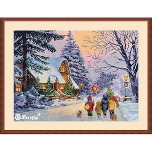 May include: A framed cross-stitch showing a winter landscape with a snow-covered house, fir trees, and children walking on a snowy path. The artwork uses a warm colour palette with a sunset in the background and the text "Merejka" in the lower left corner.