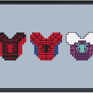 May include: Three embroidered patches in the shape of a Mickey Mouse head, each featuring a different Spider-Man suit: red and blue, black and red, and purple and white.
