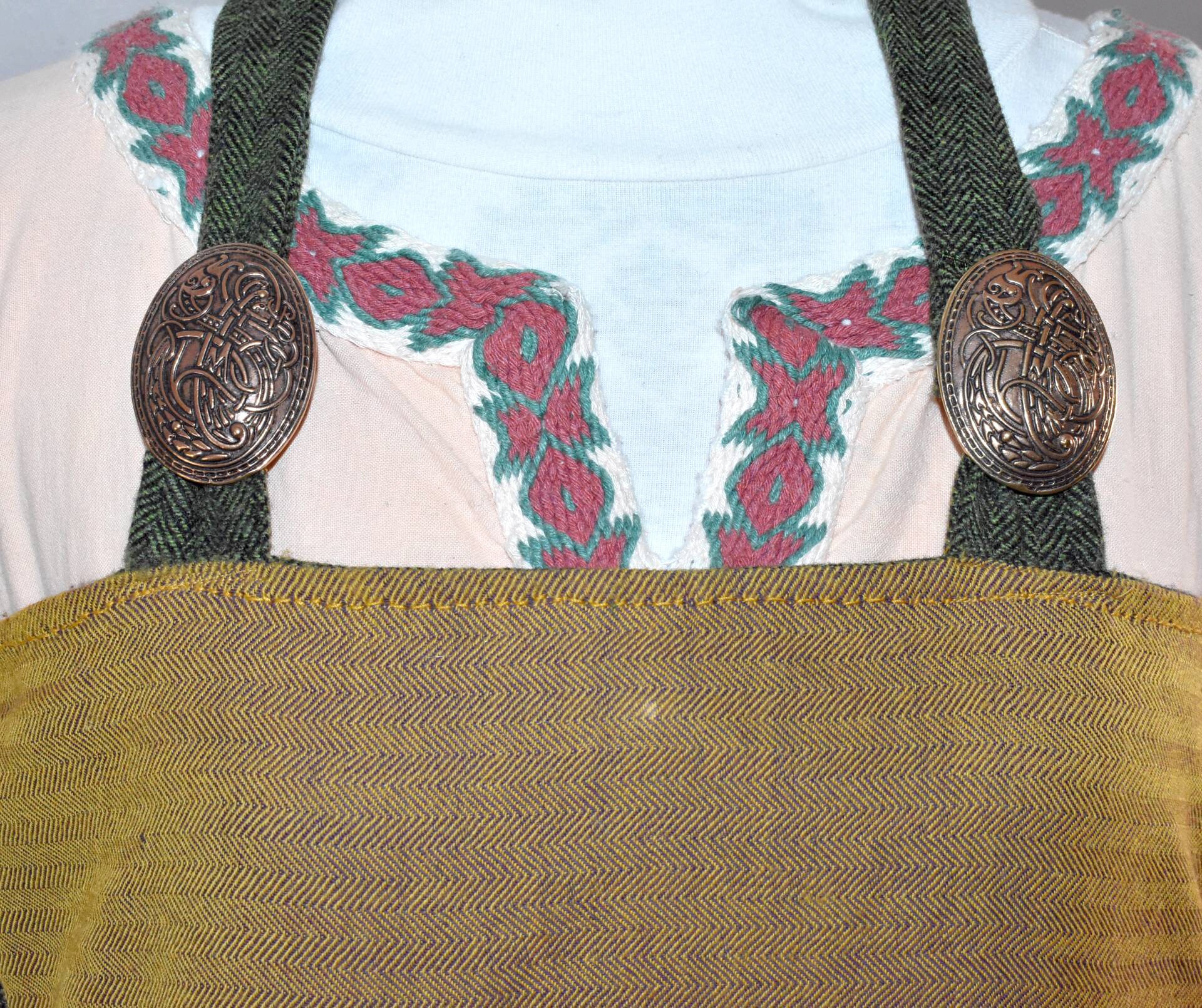 the hearthkeeper viking apron brooches