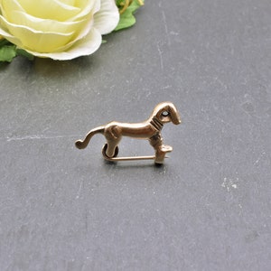 Small bronze Celtic horse fibula - replica of a Celtic period zoomorphic brooch