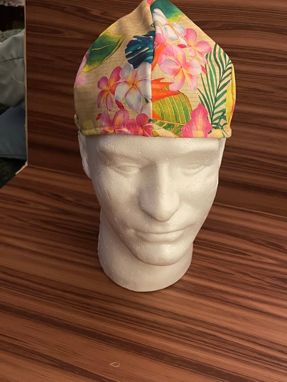 Low crown welders caps reversible