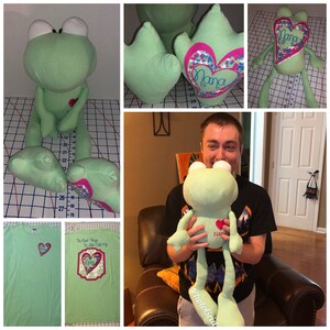 May include: A light green plush frog toy with large white eyes, a red heart, and the word "Nana" on its chest. The frog has long legs and arms. Also shown is a light green t-shirt with a heart design and the text "The Best Things in Life Call Me Nana".