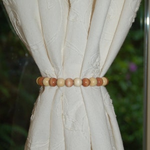 Rustic beaded jute curtain tie back. Jute rope with wooden beads: ivory, natural, dark brown. Made to order.