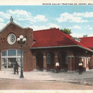 May include: Vintage postcard of the Scioto Valley Traction Co. Depot in Chillicothe, Ohio. The brick building has a red tile roof and a large arched window. A street lamp stands in front of the depot.