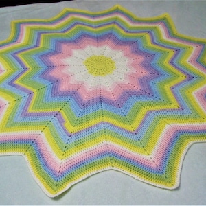 Twelve point rainbow ripple baby blanket