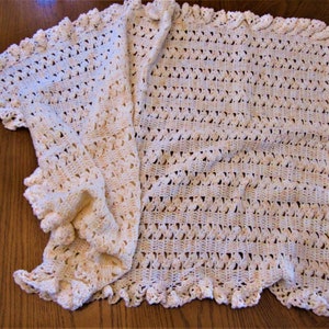 Baby girl crochet ruffled blanket.