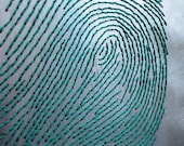 Fingerprint aluminum and wood embroidery