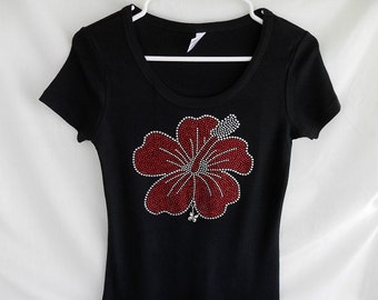 Red Hibiscus Flower Women's Rhinestone T-Shirt.   It Comes With A Removable Butterfly Charm Or Choose A Charm From The 2nd Picture