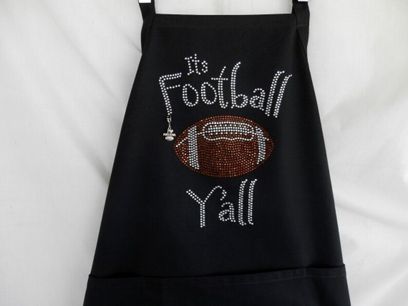 Happy Thanksgiving Yall Shell Bling >> Its Football Yall Womens Rhinestone Apron It Comes With A Removable I Heart Football Charm Or Choose A Charm From The 2nd Pic Tail Gate Happy Thanksgiving Yall Shell Bling >> Its Football Yall Womens Rhinestone Apron It Comes With A Removable I Heart Football Charm Or Choose A Charm From The 2nd Pic Tail Gate