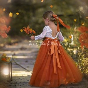 Long Sleeve, Lace and Tulle Floral Burnt Orange Flower Girl Dress for Boho Fall Weddings. Perfect Princess Dress for Toddlers and Girls. Elegant and stylish for special occasions. Great for girls holiday dress or family photo shoots as well.