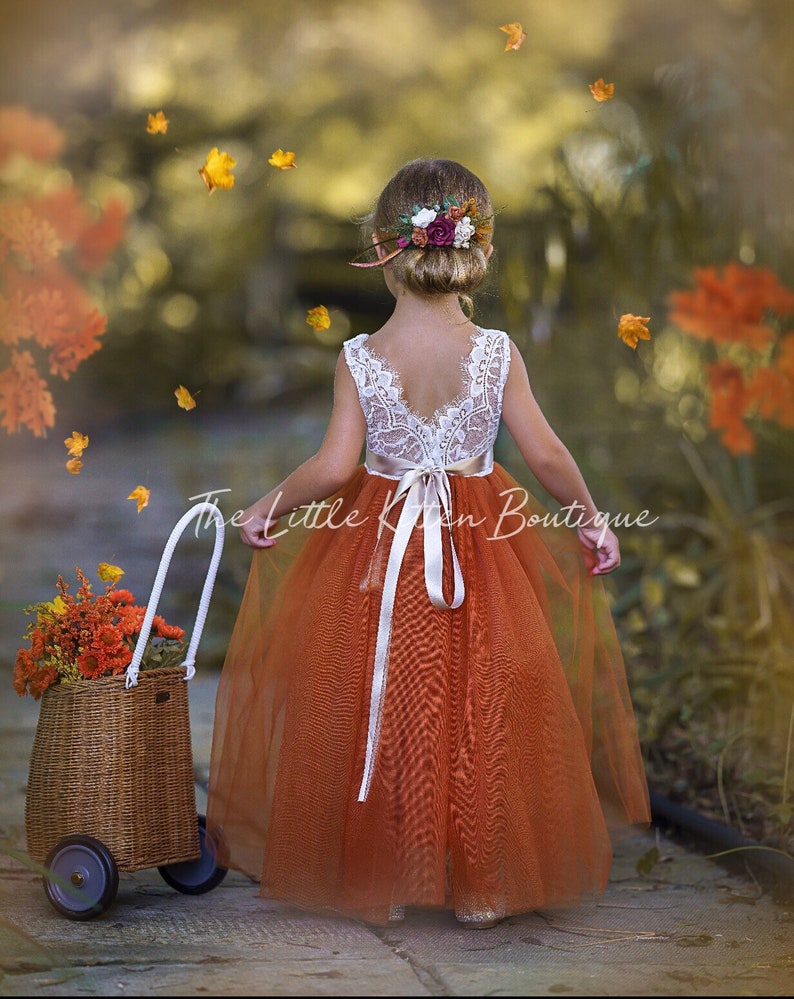 Sleeveless burnt orange lace and tulle girls flower girl dress, perfect for that fall wedding. Our dresses are made of bridal grade tulle and soft white stretchy lace. Perfect for that boho wedding, halloween weddings, fall wedding dress