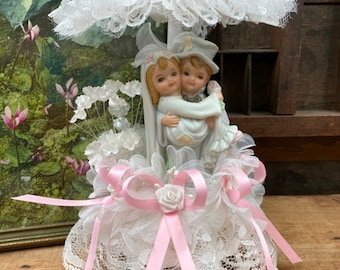 Vintage Bride And Groom Kitschy Wedding Cake Topper By Lomey Mfg Deer Park NY USA Lots Of Lace Ruffles and Pink Bows