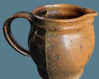 Vintage 1970-tals Studio Art Pottery gräddkanna med bruna och svarta glasyrer