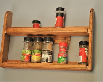 Red oak spice rack 18" wide, holds 16 jars (2" in diameter), teak stain