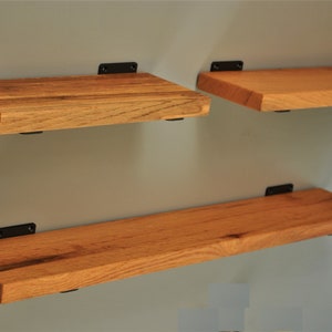 reserved for Donald: two sets of Red Oak wall shelves, 36", 24", 16" lengths