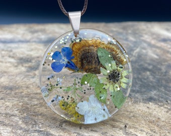 Turkey tail mushroom, flowers, and glitter Resin Necklace