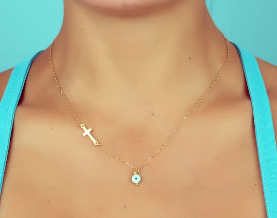 Layered sideways 2024 cross necklace