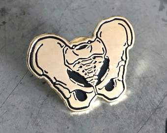 Gold Pelvis Bone Pin | Anatomy, Skeleton, Anatomical | Nurse Student Doctor Medicine Medical Gift | Weird, Oddities | Hard Enamel Lapel Pin