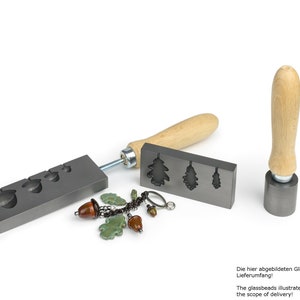 Bead roller with four acorns, one-sided mandrel guide and tool for oak leaves in set