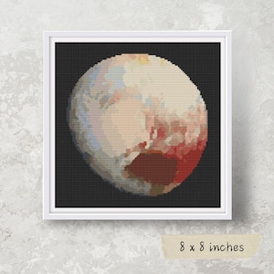 May include: A cross-stitch pattern of the planet Mars, featuring a detailed depiction of its red, brown, and white surface. The pattern is framed in a white frame and measures 8 x 8 inches.