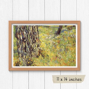 May include: A framed cross-stitch artwork depicting a close-up of two tree trunks in a field of yellow, green, and white flowers. The artwork is 11 x 14 inches.