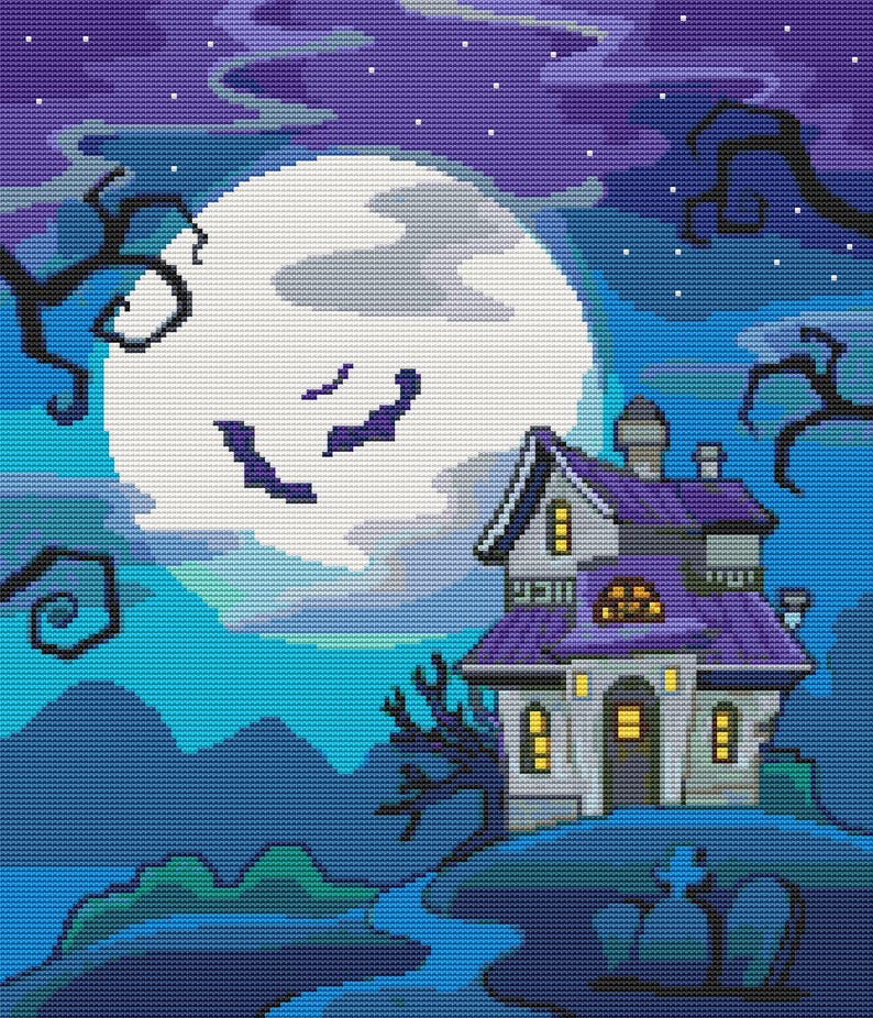 May include: A cross-stitch pattern featuring a large white full moon in a dark purple and blue night sky. A two-story house with a purple roof and glowing yellow windows sits on a hill. Bare, dark tree branches frame the scene, and small tombstones are visible in the foreground.